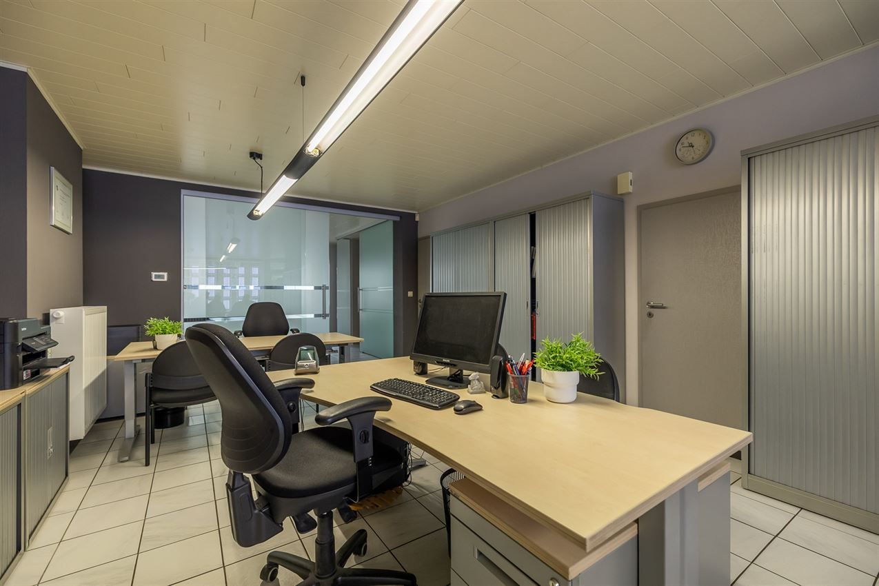 Verzorgd gebouw met handelszaak en 2 apt foto 46