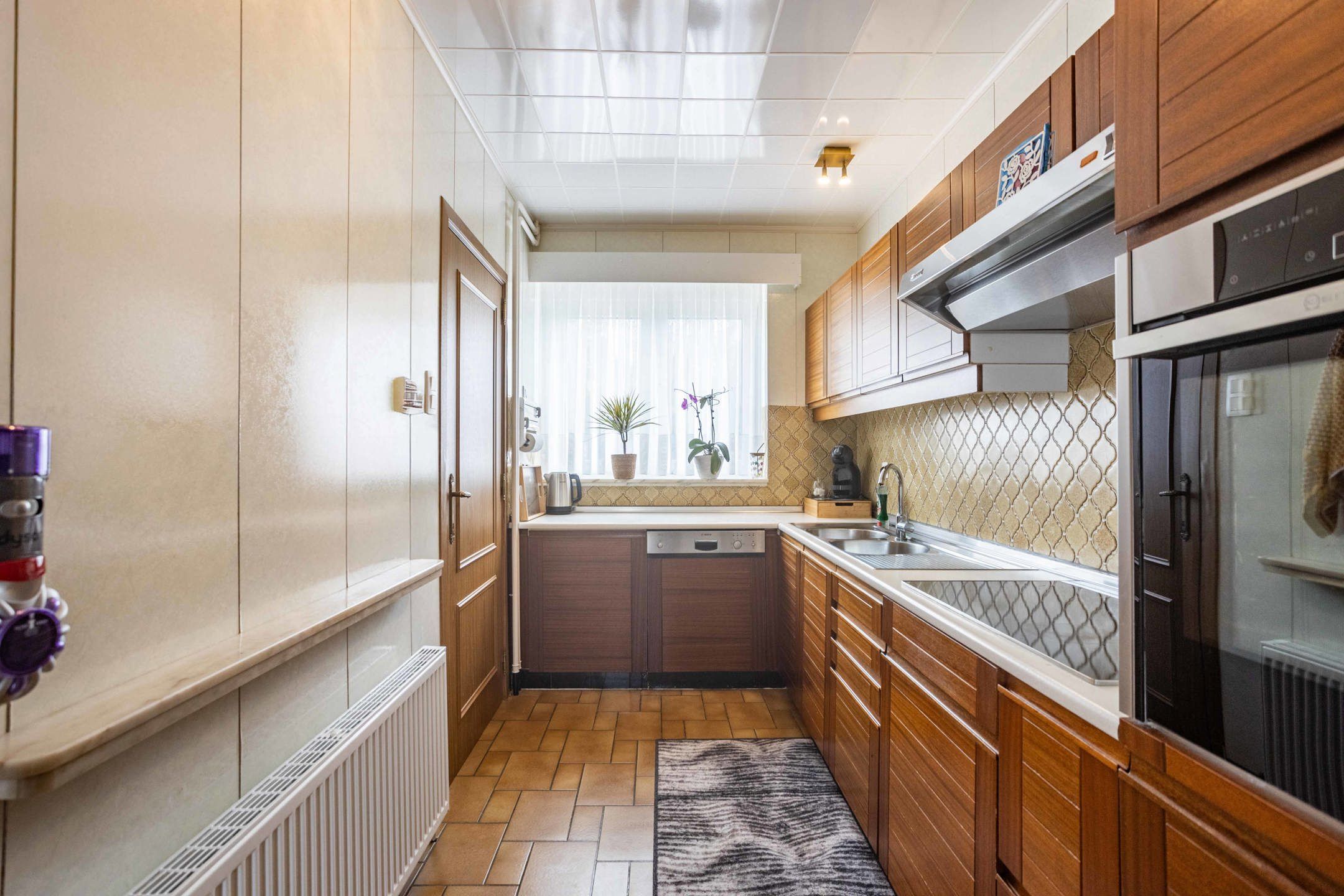 Gezinswoning met 4 slaapkamers, tuin en achteruitweg  foto 7