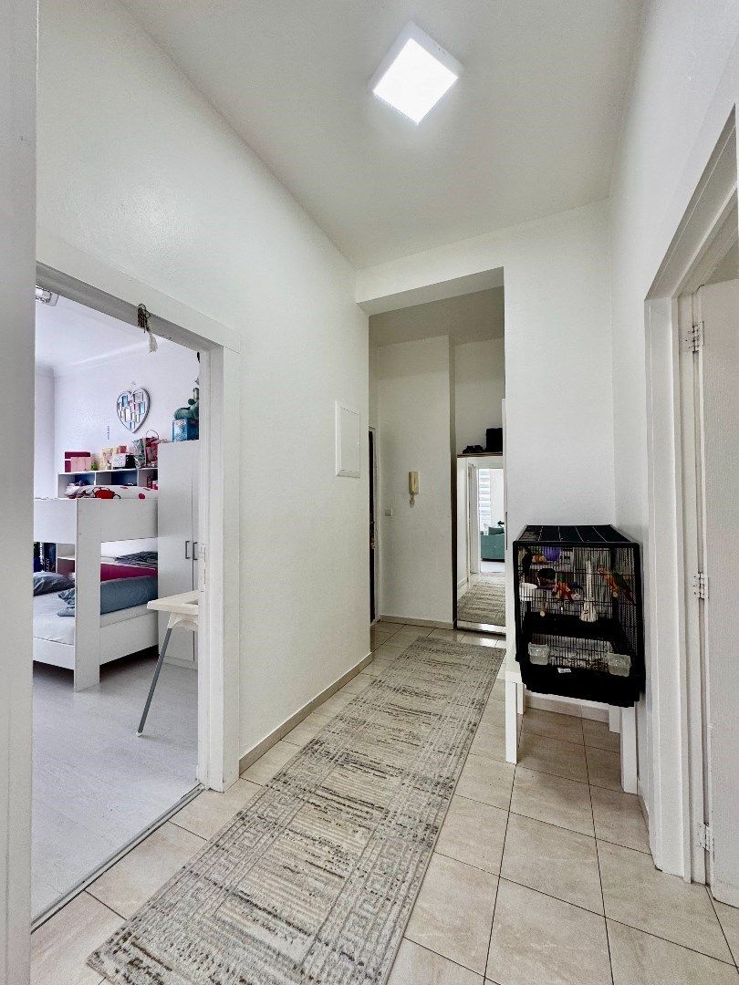 Licht en ruim 2-slaapkamerappartement te koop in Laken foto 12