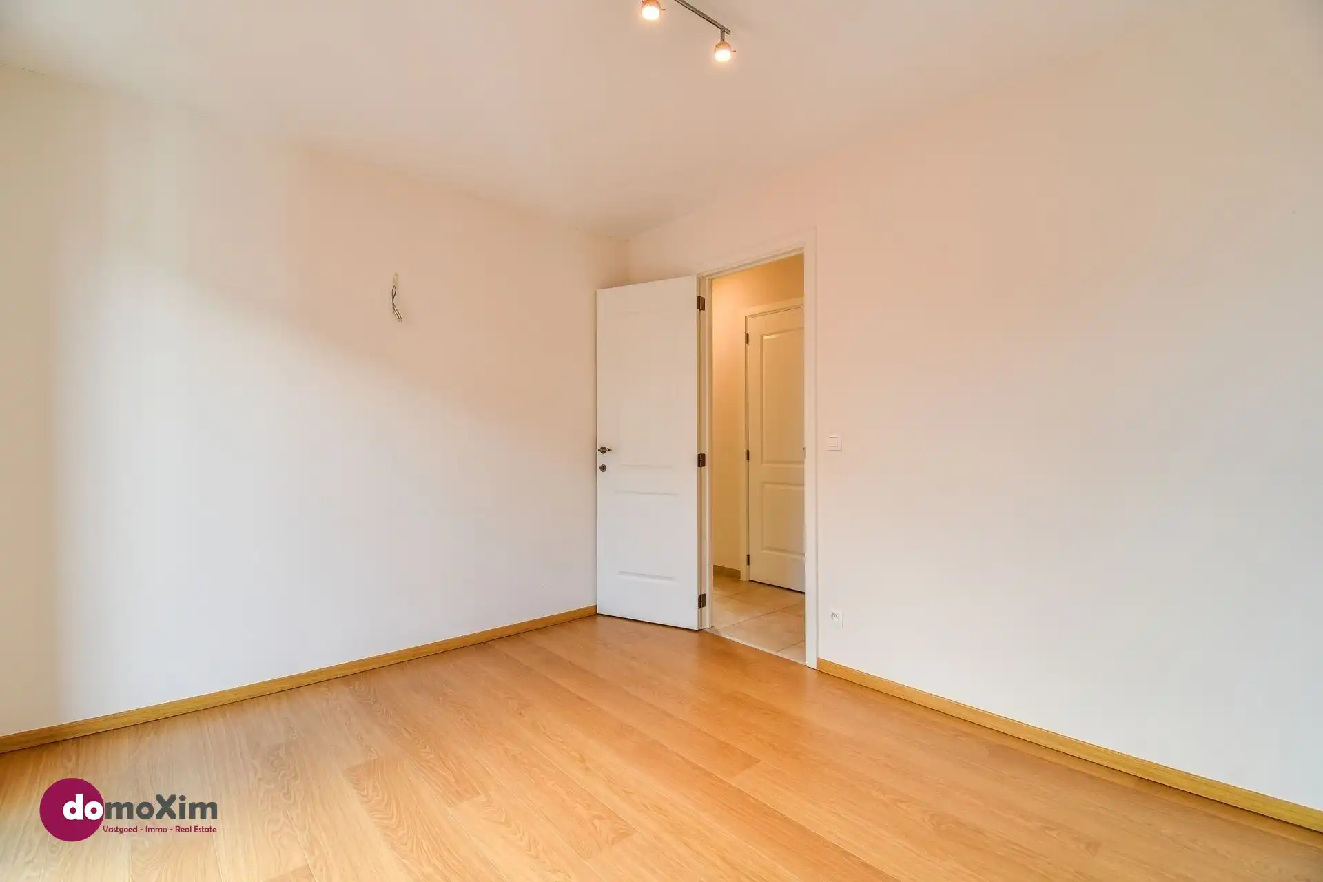 Instapklaar 3-slaapkamer appartement met parking in hartje Boortmeerbeek foto 13
