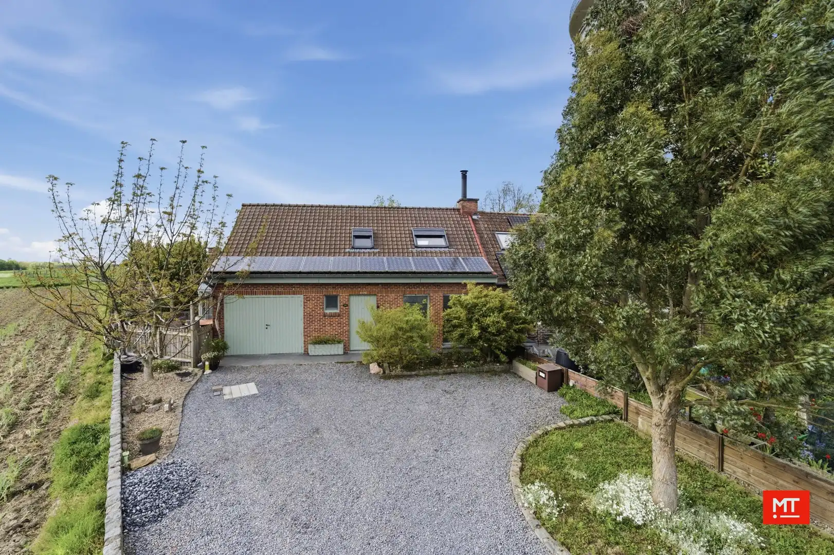 Hoofdfoto van de publicatie: Charmante halfopen woning op een landelijke locatie in Gullegem