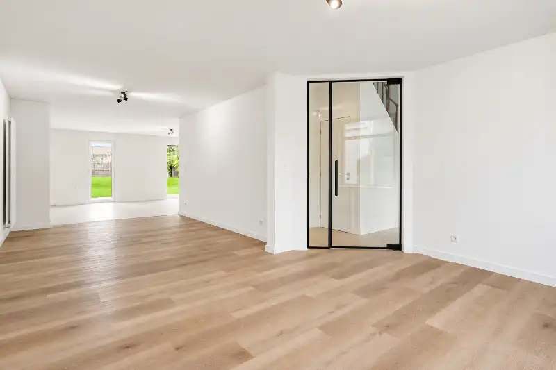 Ruime en instapklare woning met 4 slaapkamers en tuin foto 2