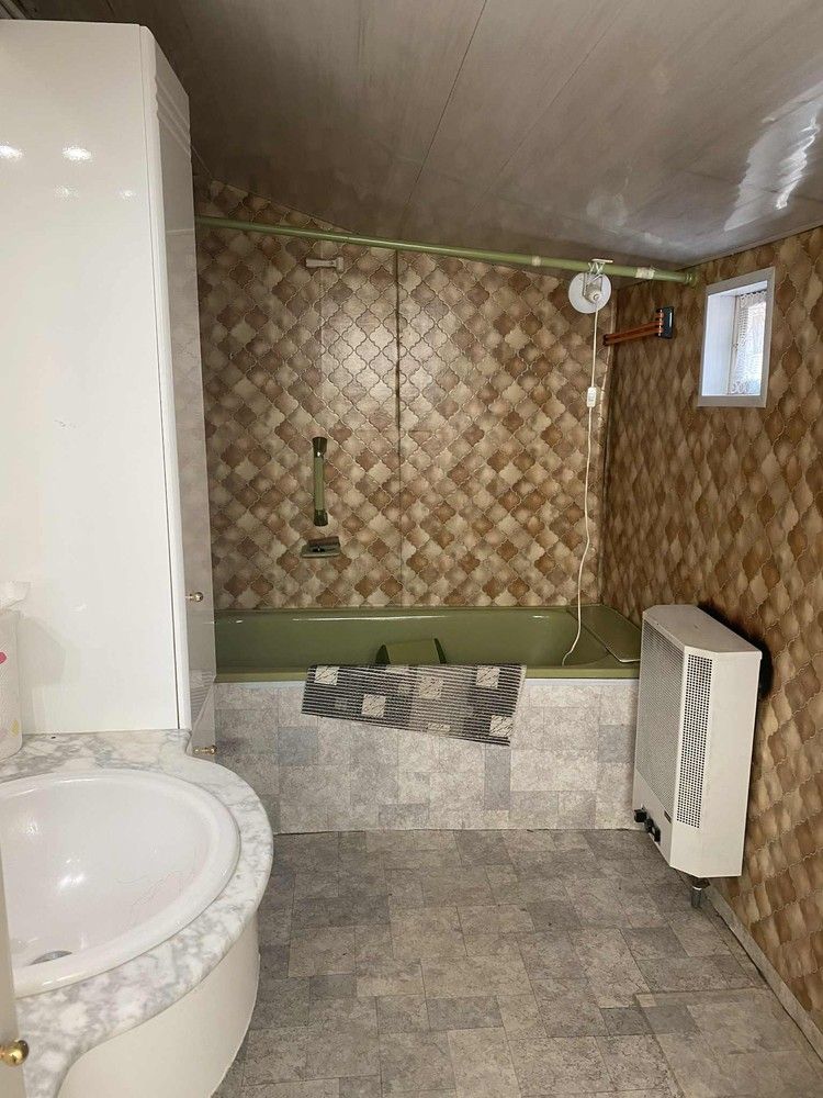 Te renoveren rijwoning met tuin en garage – centraal gelegen met veel potentieel! foto 5