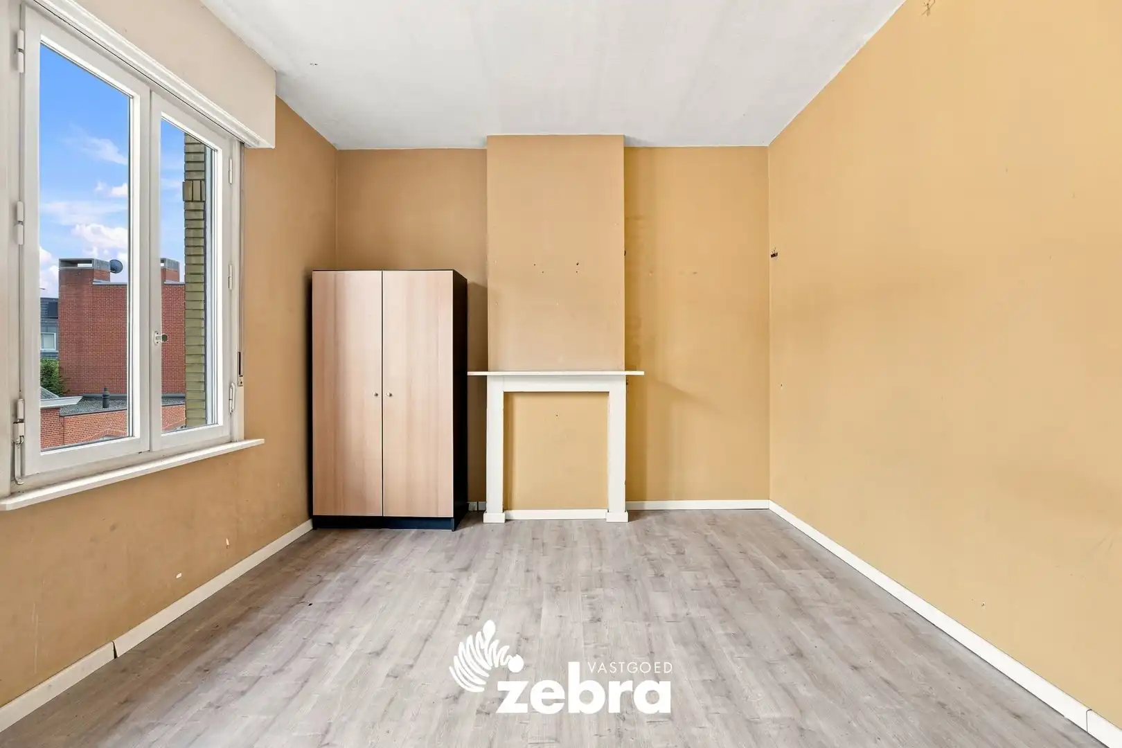 Op te frissen woning met 4 slaapkamers en ruime tuin met uitweg te Tielt! foto 21