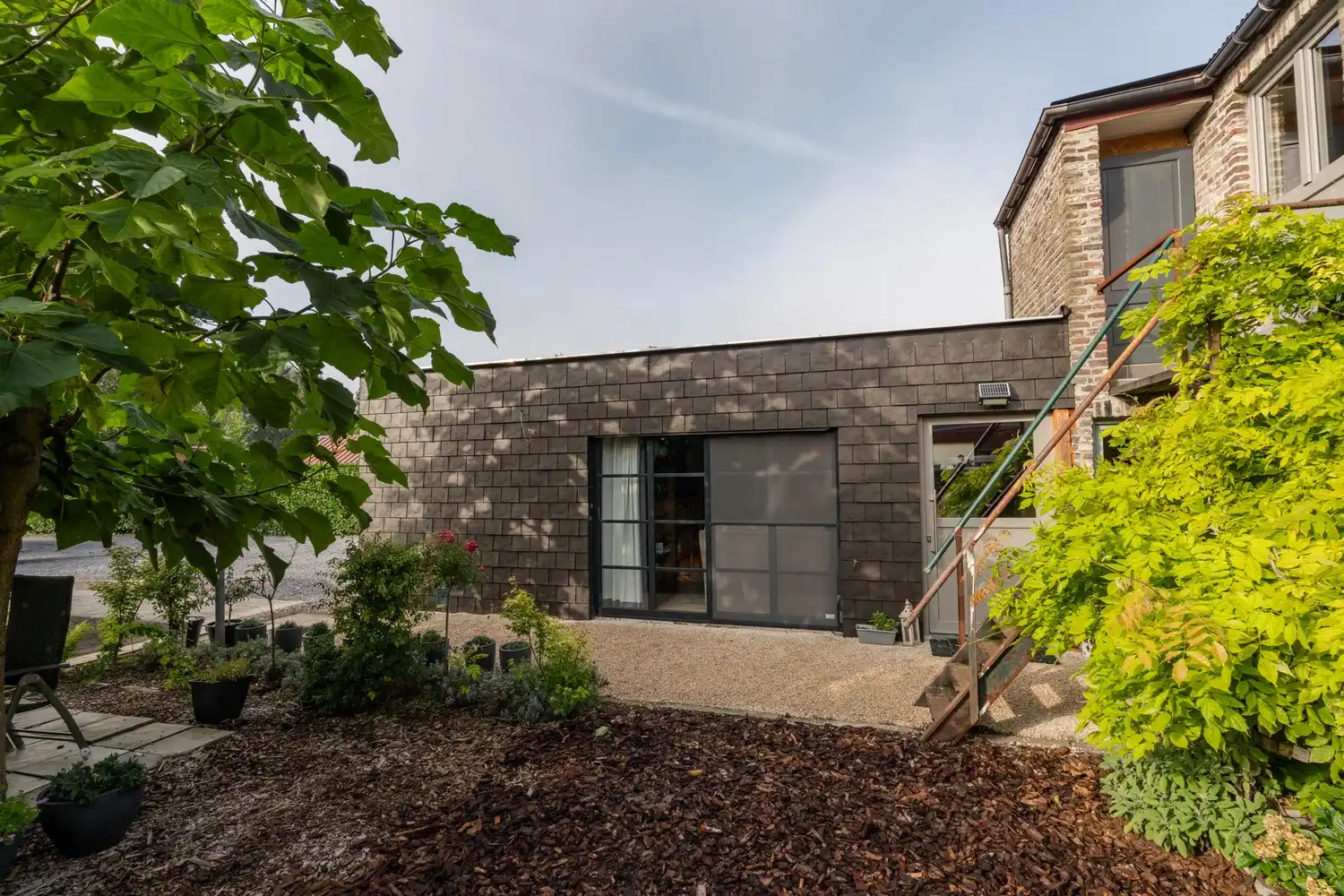 Veelzijdige woning met zorgmogelijkheden, werkruimte en tal van bijgebouwen foto 32