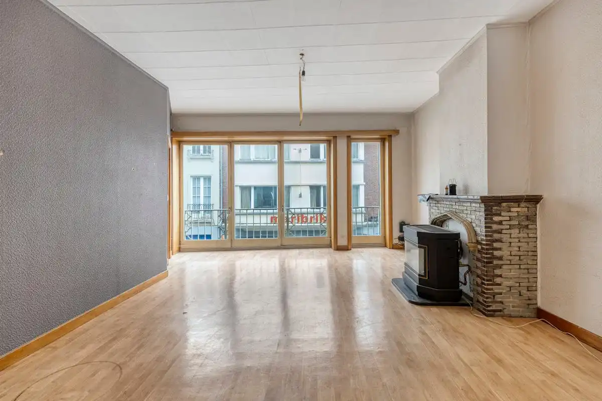 Opbrengsteigendom met renovatiepotentieel op toplocatie in Kortrijk foto 11