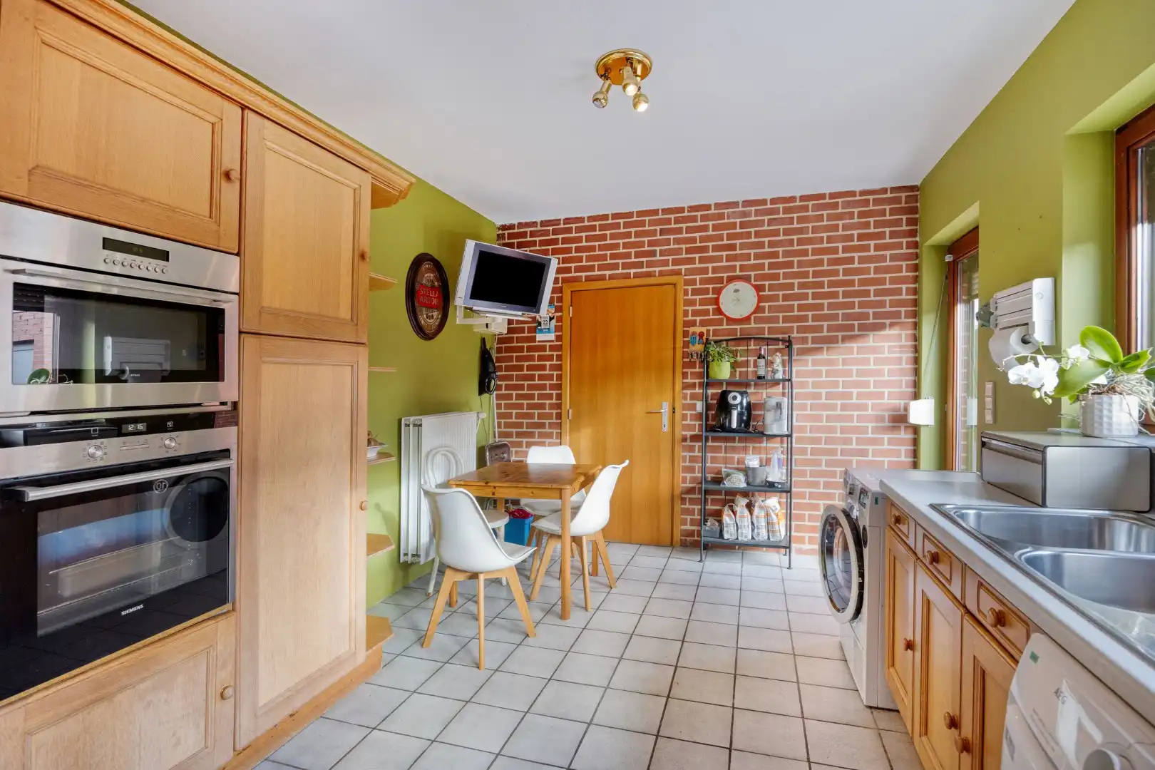 Halfopen bebouwing met 3 slaapkamers, tuin en garage in Kessel-Lo – EPC 348 kWh/m² - bewoonbare opp. 157 m² foto 10