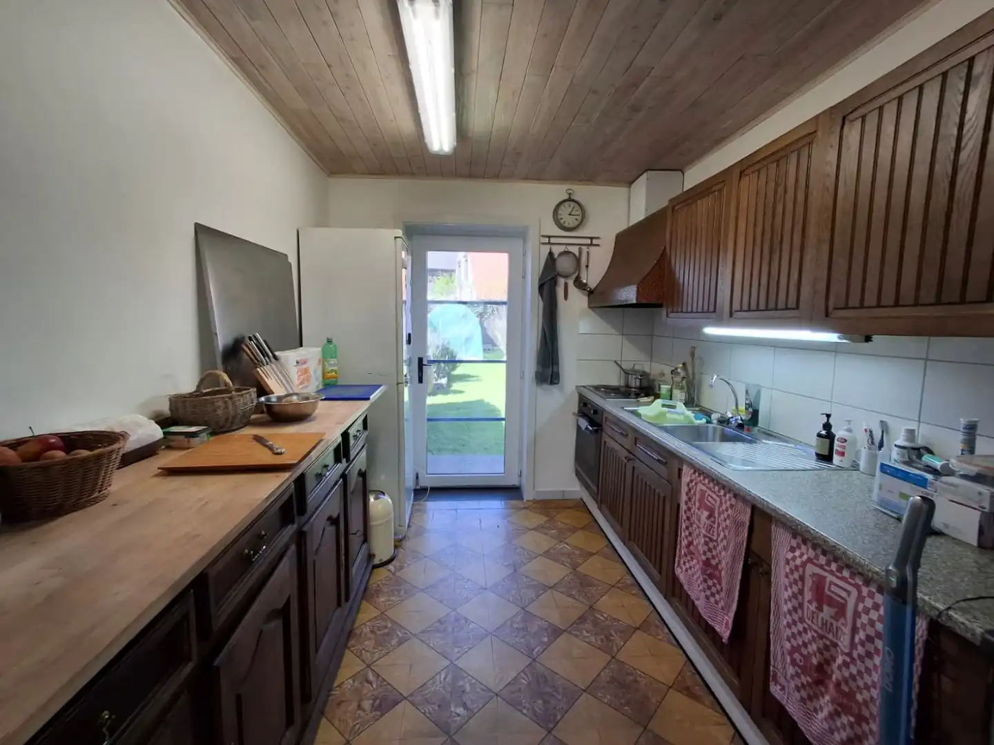 CHARMANTE  KLEINE WONING MET TUIN IN HET CENTRUM VAN AARSELE foto 3