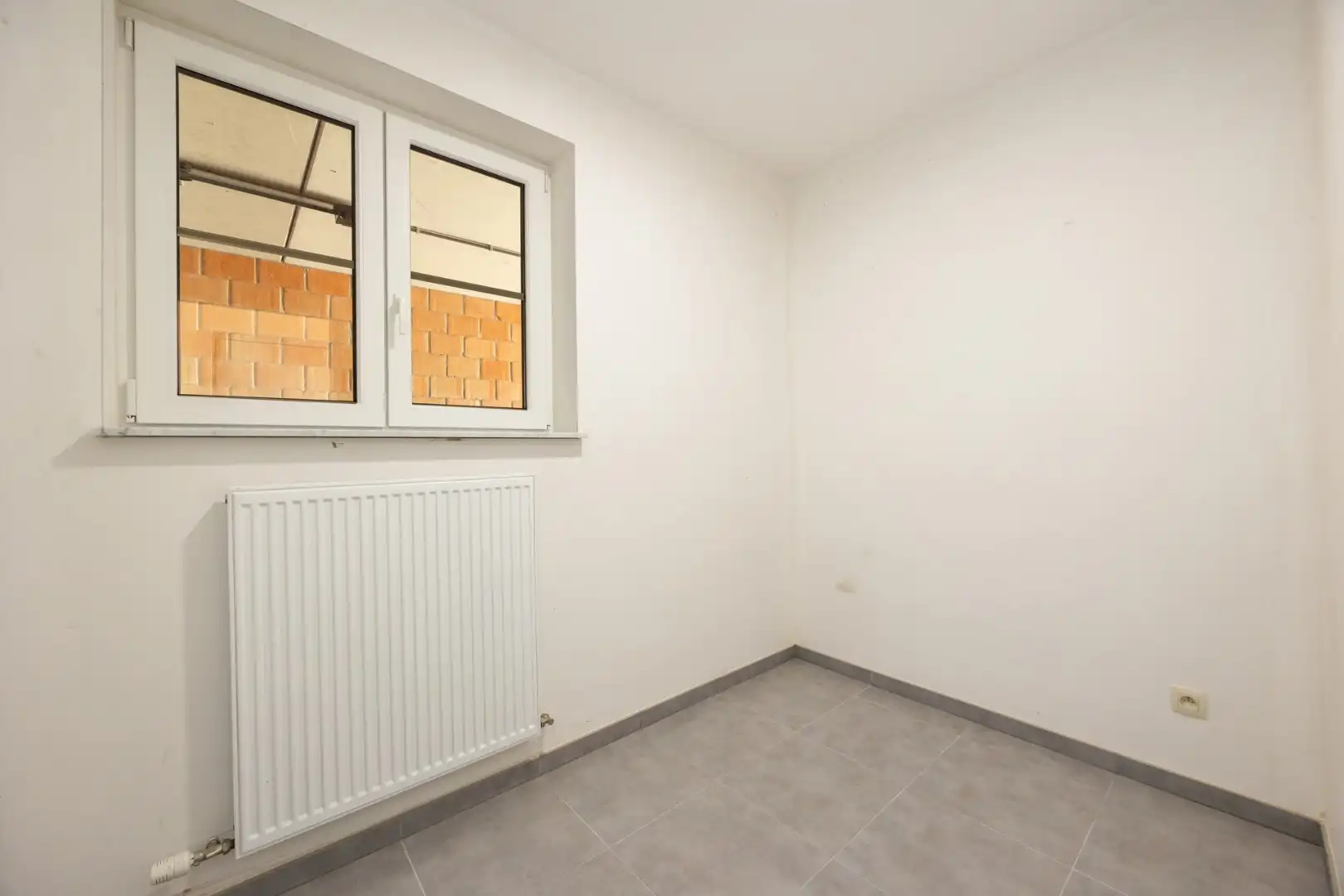 Energiezuinig gelijkvloers appartement met carport in het centrum van Broechem foto 6