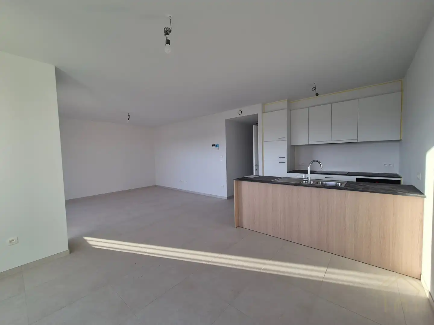 Nieuwbouwappartement met 2 slaapkamers en garage foto {{pictureIndex}}