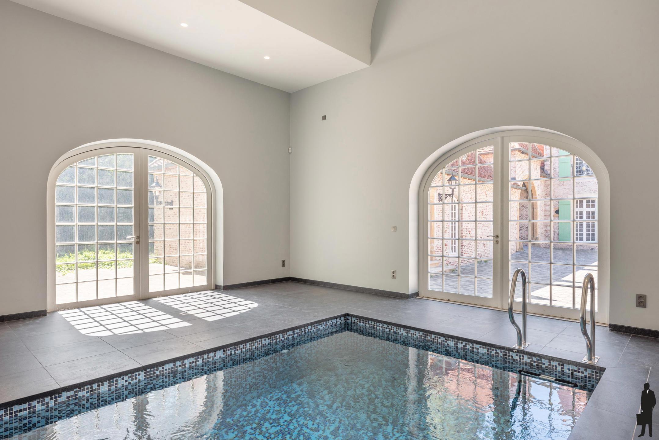 Uniek perceel met U-vorm woning, wellness én conciërgewoonst / zorgwonen en dit op ca. 2.8 hectare! foto 13