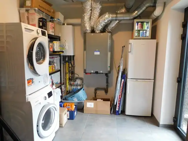 Rustig gelegen gelijkvloers appartement met tuin en carport foto 12