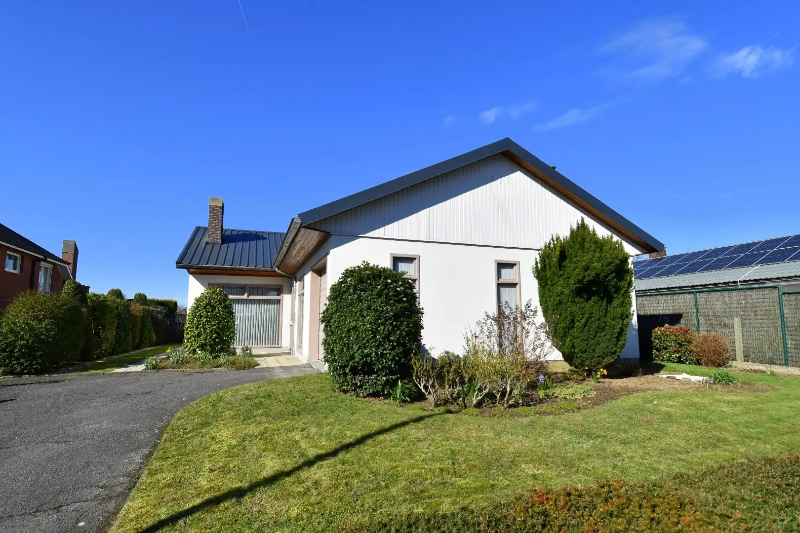 Gelijkvloerse woning met 3 slaapkamers en 2 garages te koop op een perceel van 1087 m² in Wevelgem foto 18