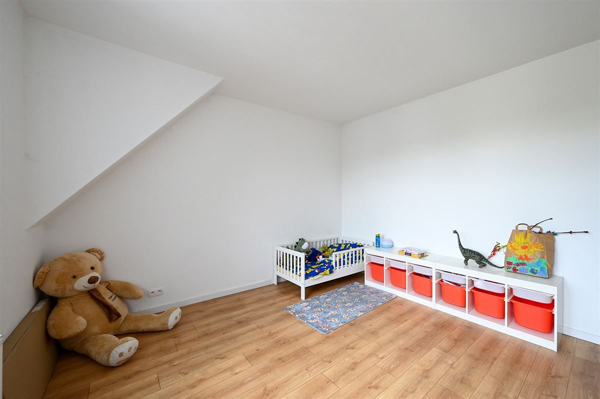 Lichte woning met diepe tuin foto 18