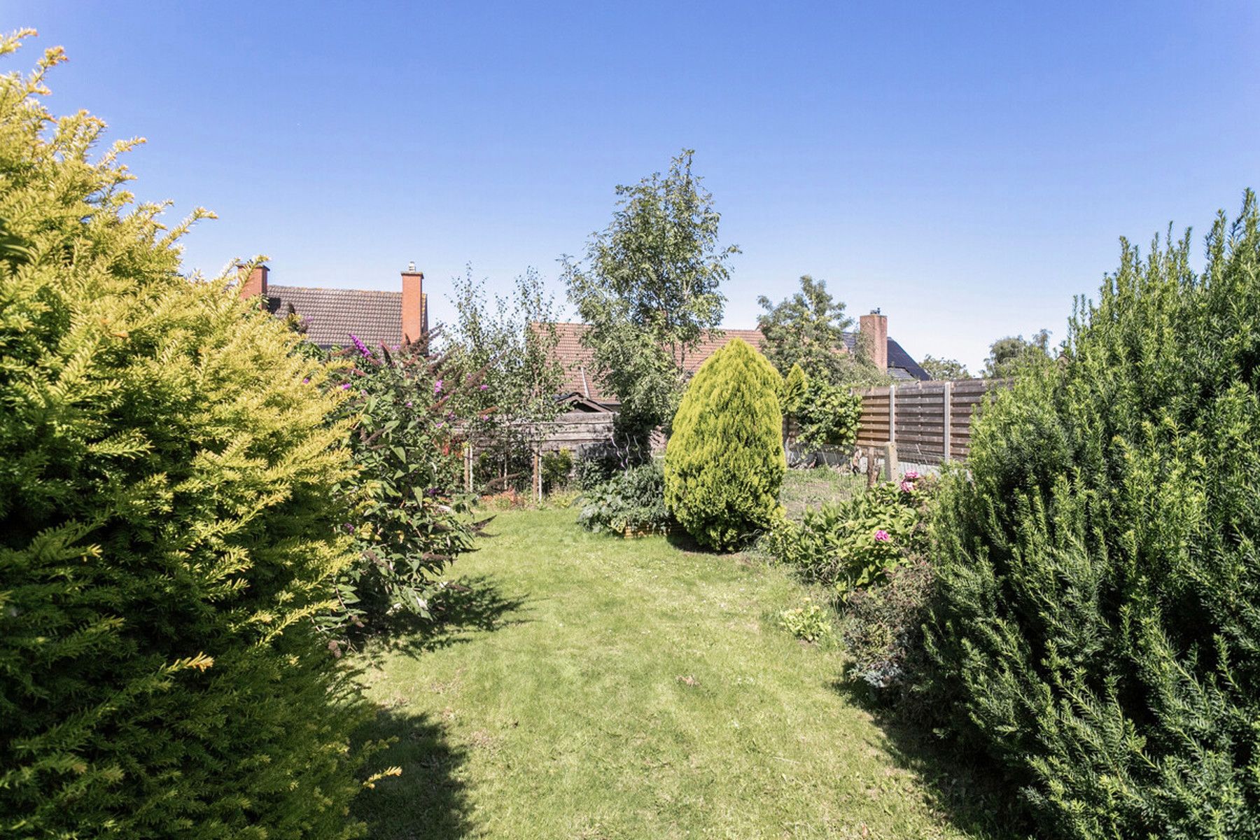 Mooie burgerwoning met tuin ! foto 32
