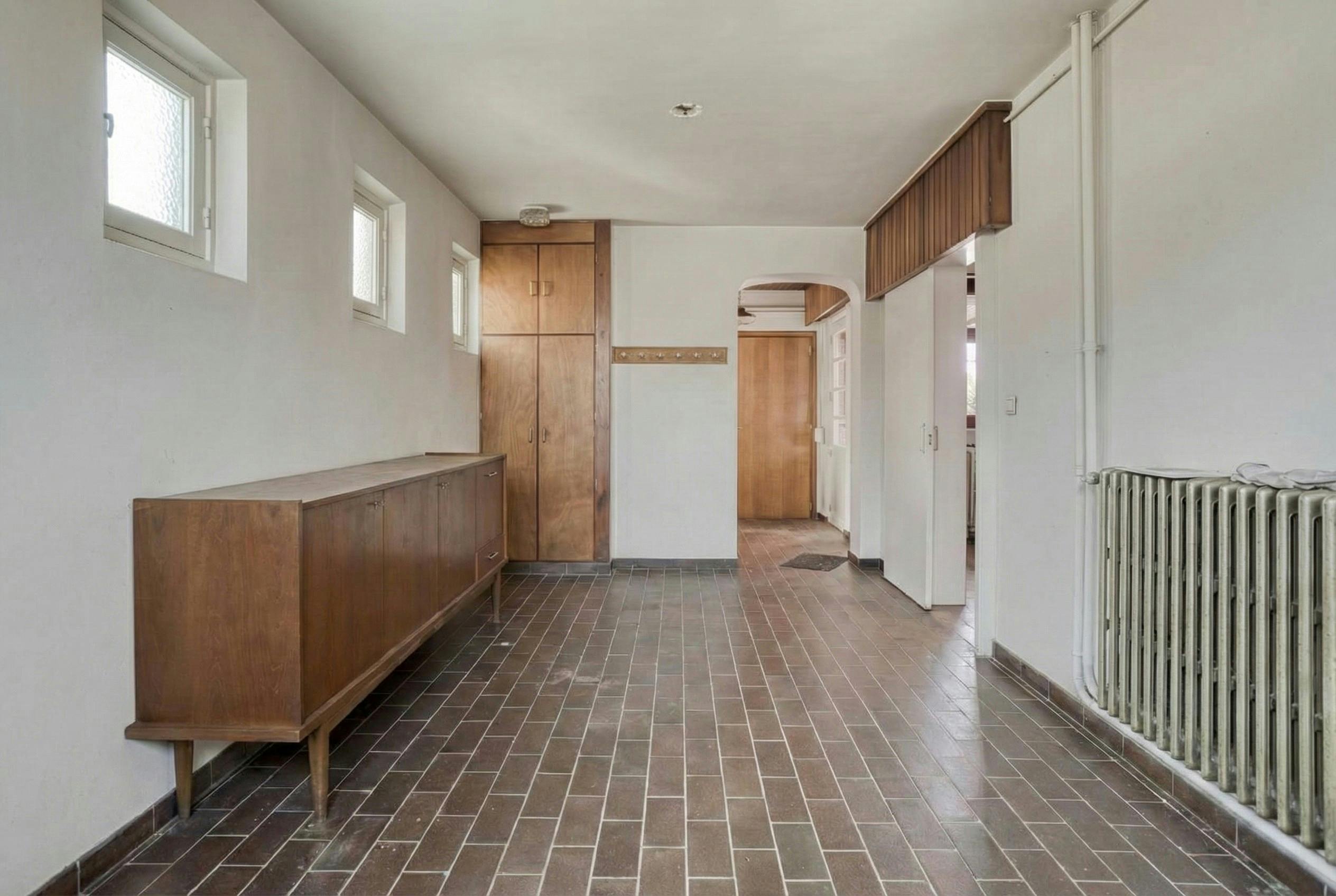 Te renoveren woning te koop net buiten het centrum van Retie foto 12