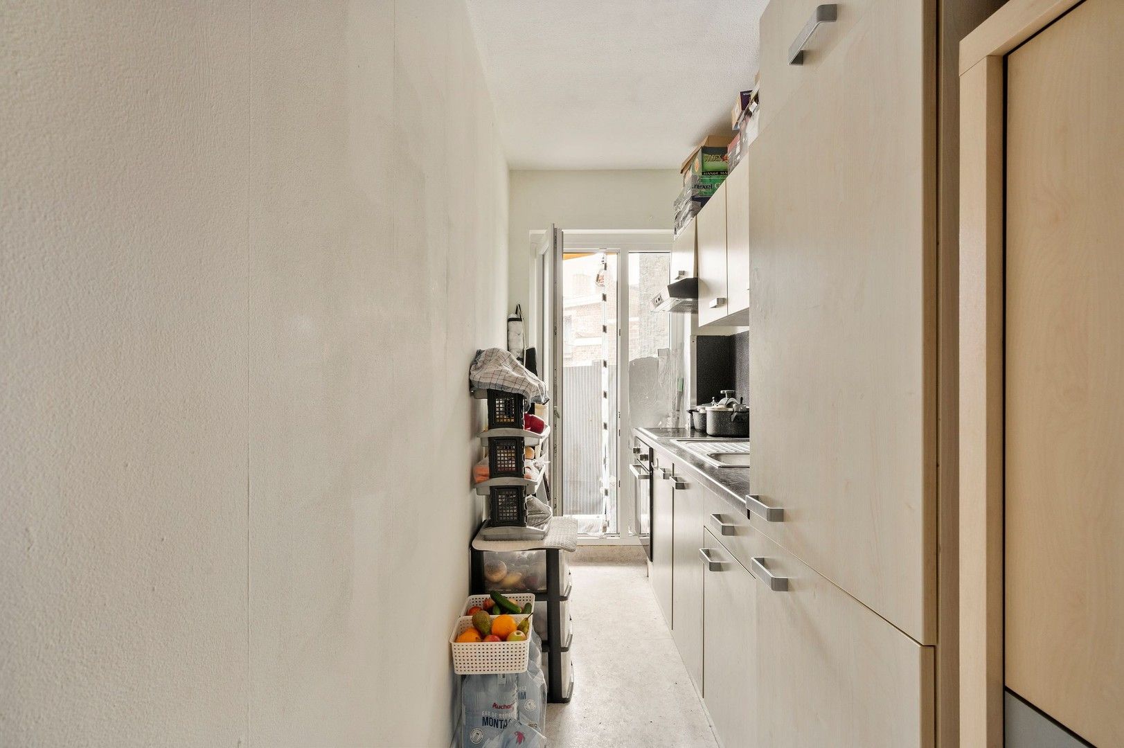 Energiezuinig en gezellig verhuurd appartement met 2 slaapkamers en balkon achteraan nabij het station van Kortrijk foto 9