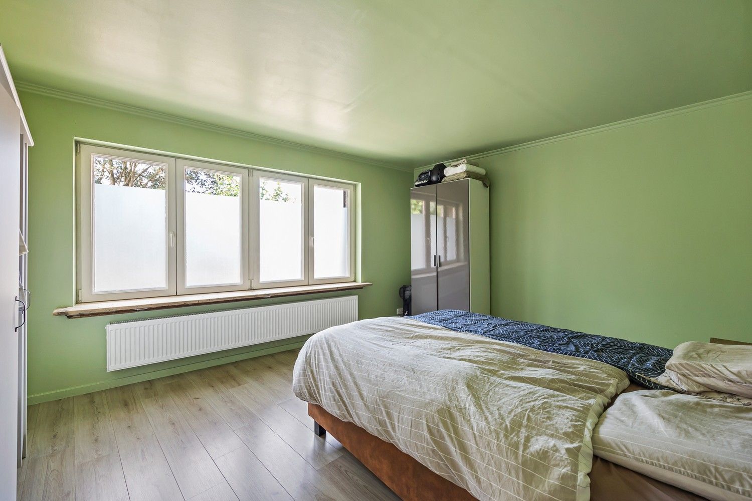 Ruime gezinswoning met 4 slaapkamers, prachtige tuin en garage in Boom foto 16