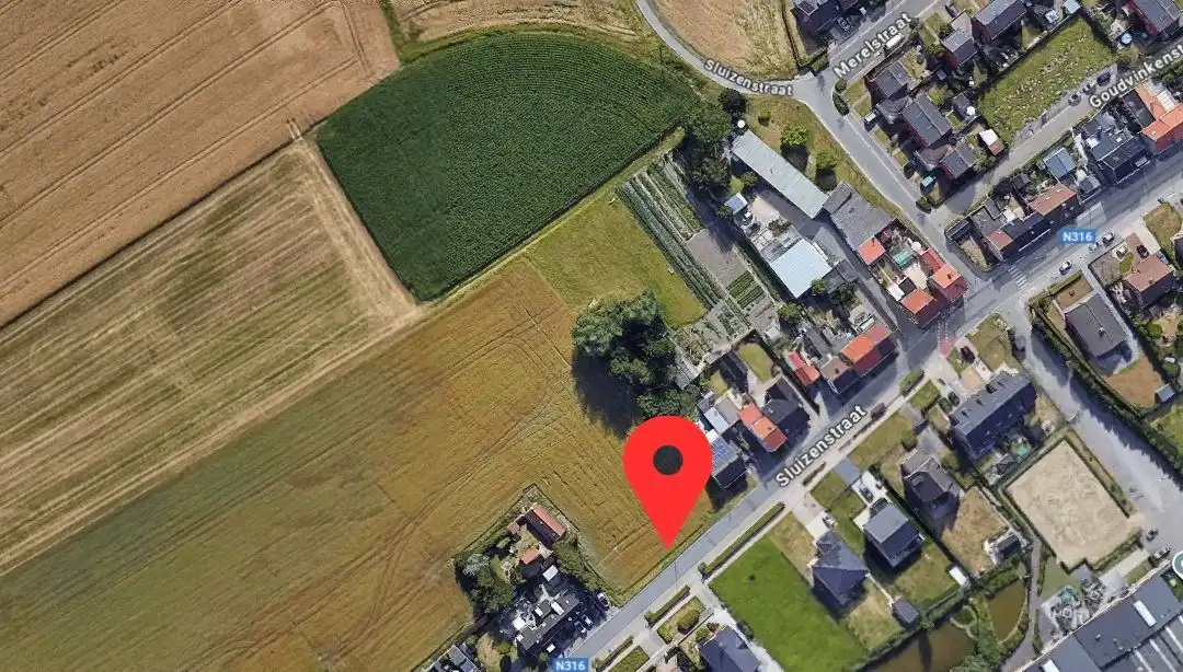 Stijlvolle, halfopen nieuwbouwwoning met oprit en grote, zonnige tuin! foto 2