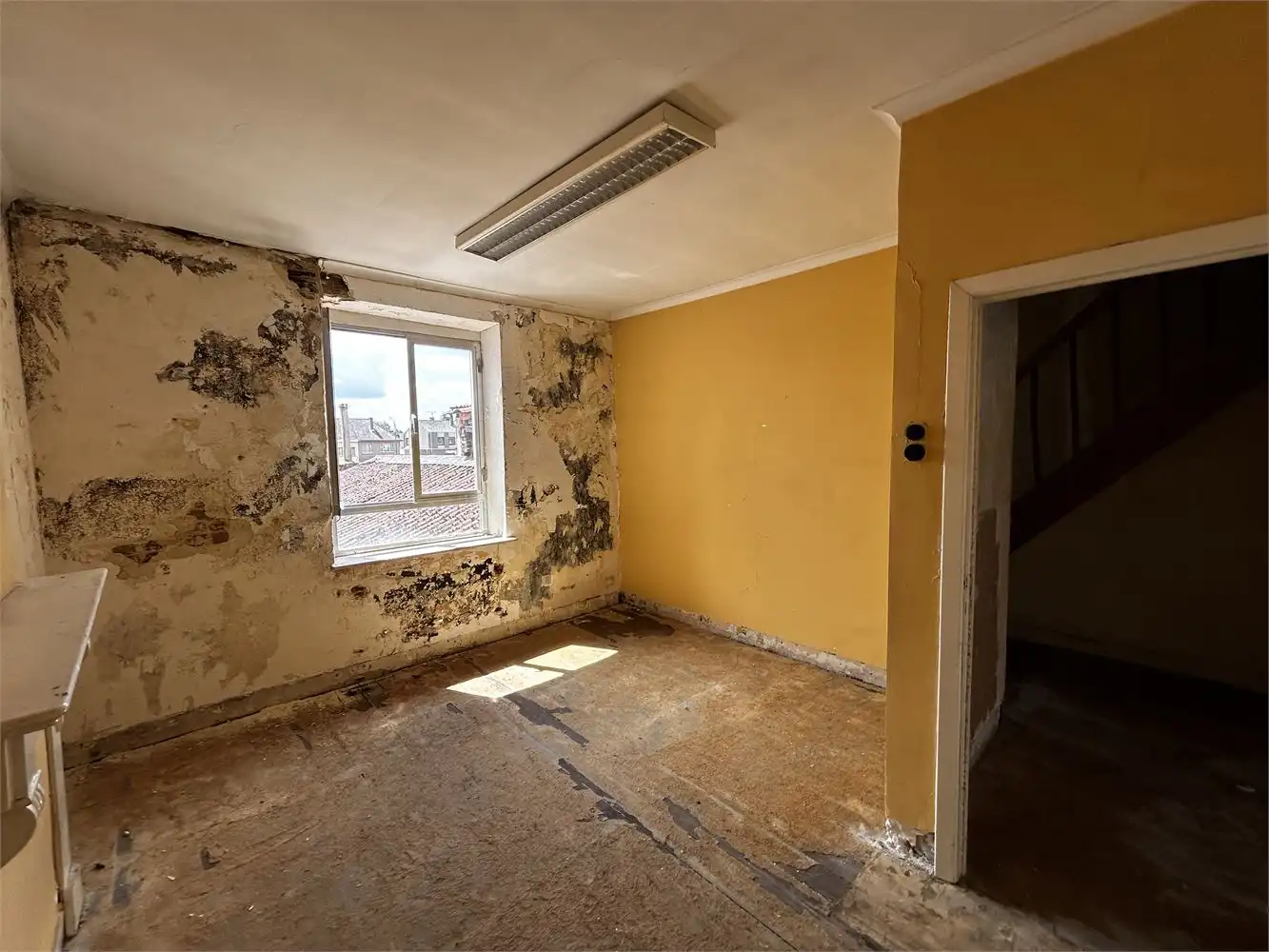 Te renoveren handelshuis met woonst foto 34