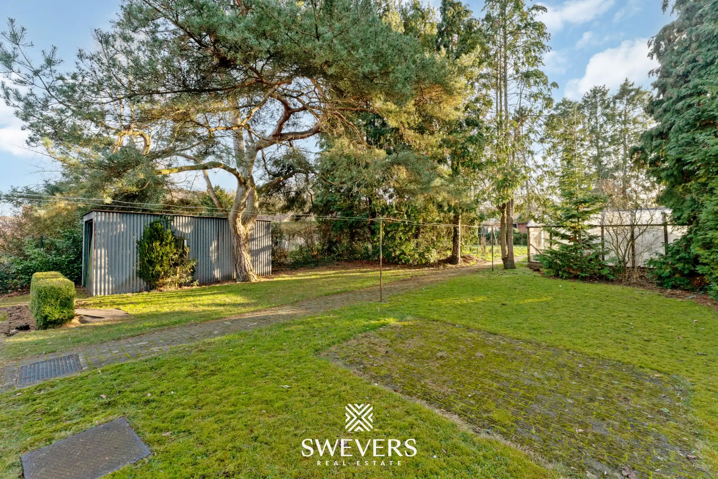 Vrijstaande woning met drie slaapkamers, bureauruimte en tuin in Houthalen foto 26