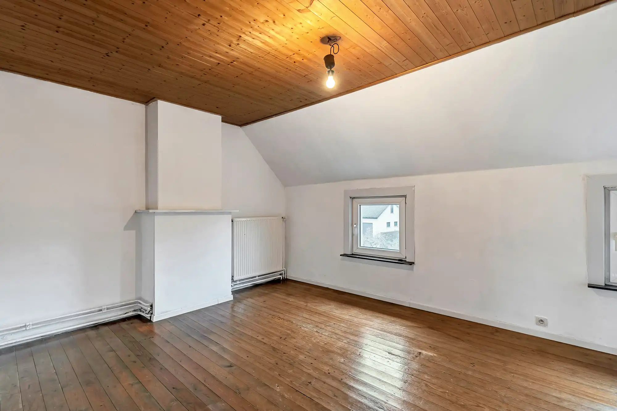 Gezellige rijwoning met tuin en achteruitweg foto 10