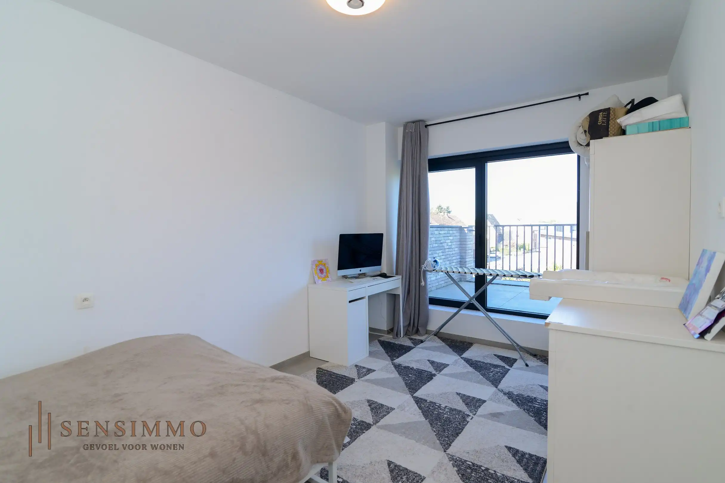 Instapklaar & energiezuinig 1-slaapkamerappartement met 2 terrassen en parking in Maasmechelen foto 8