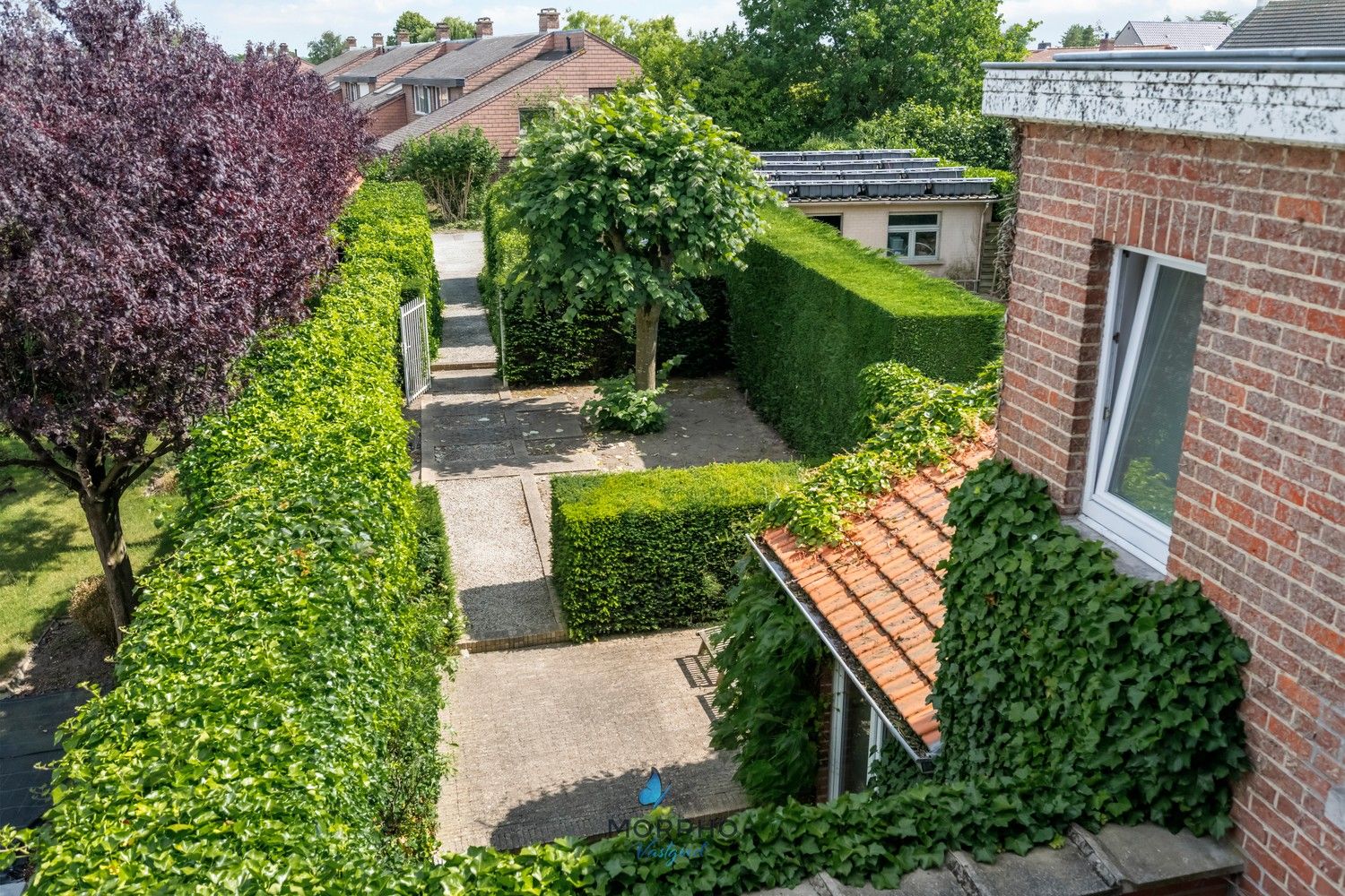Te Koop: Stijlvol en lichtrijk herenhuis met 5 kamers, zonnige tuin en meerdere parkeerplaatsen in hartje Ruddervoorde foto 4