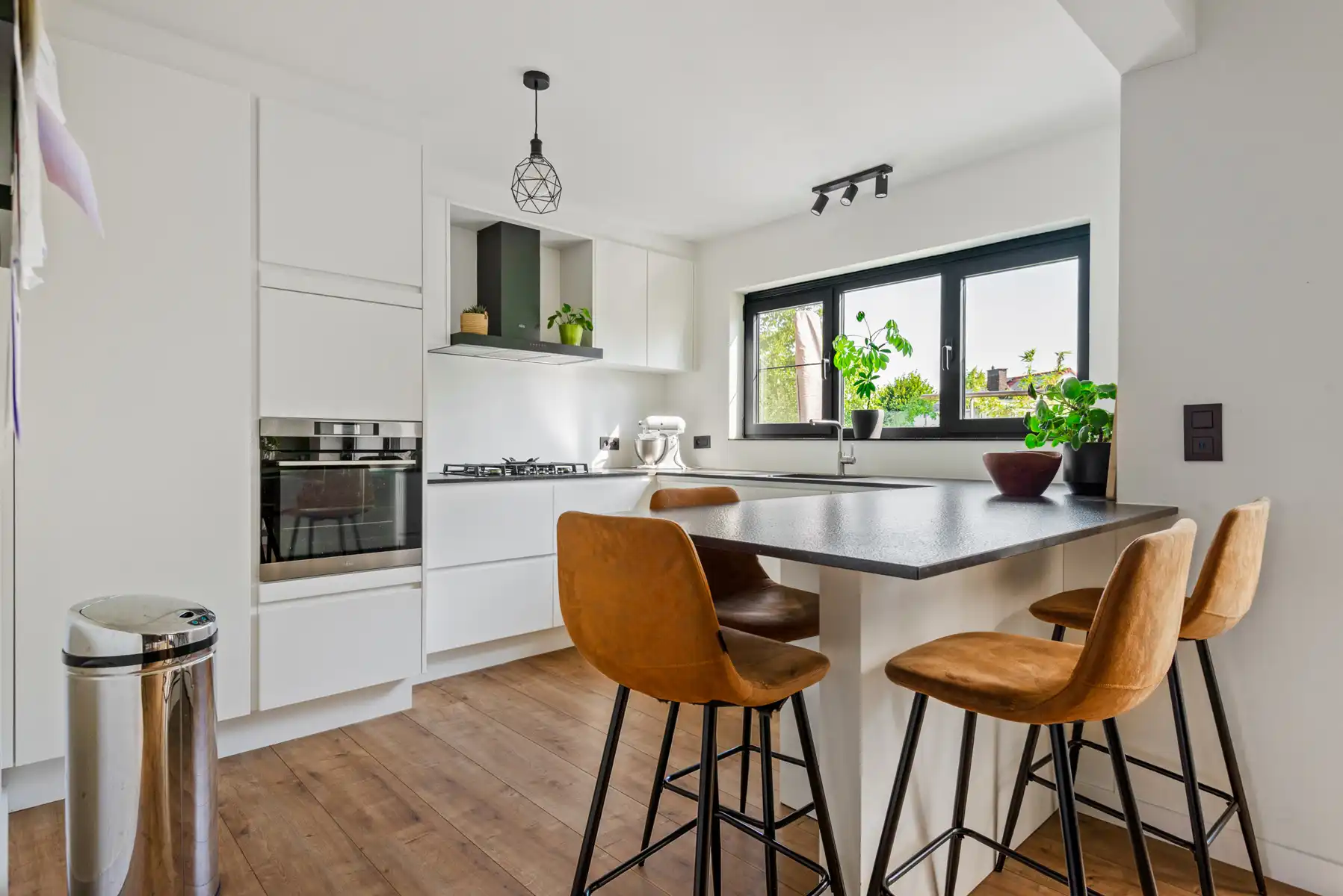Ruime instapklare beletagewoning met bijna 250 m² bewoonbare oppervlakte, rustgevende tuin én dakterras foto 6