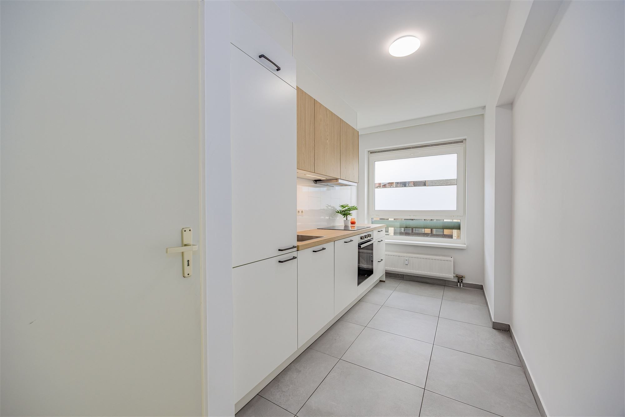 Gerenoveerd appartement met 2 slaapkamers en terras foto 7