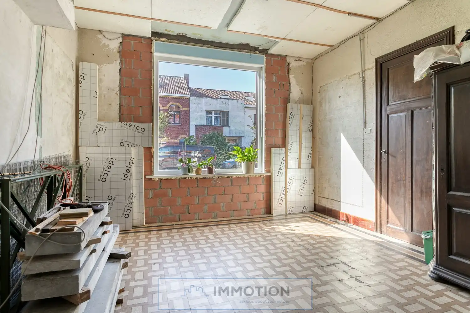 Karaktervolle stadswoning met renovatiepotentieel en unieke troef foto 3