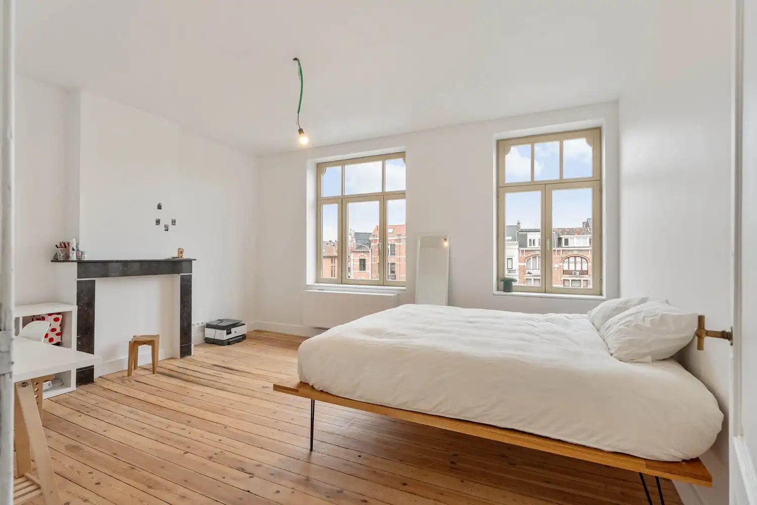 Prachtig gerenoveerd en energiezuinig herenhuis met 5 slaapkamers, 2 badkamers en een tuin op een toplocatie nabij het station van Leuven! foto 27