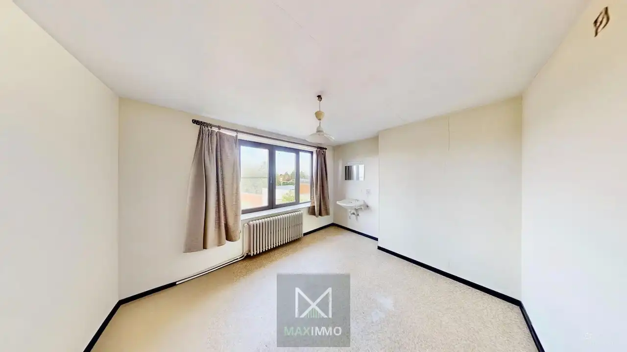 Ruime hoekwoning met 3 garages, polyvalente ruimtes én tuin in hartje Lauwe foto 13