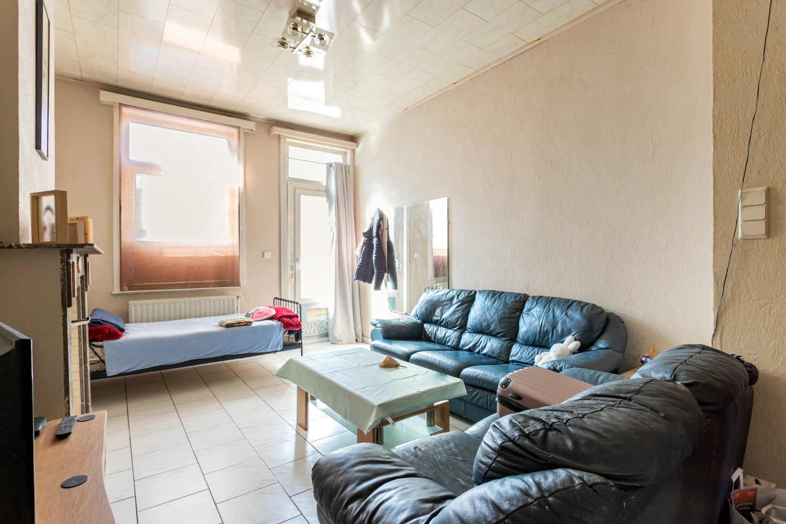 Op te frissen woning met 2 à 3 slpk en tuin te Buizingen. foto 2