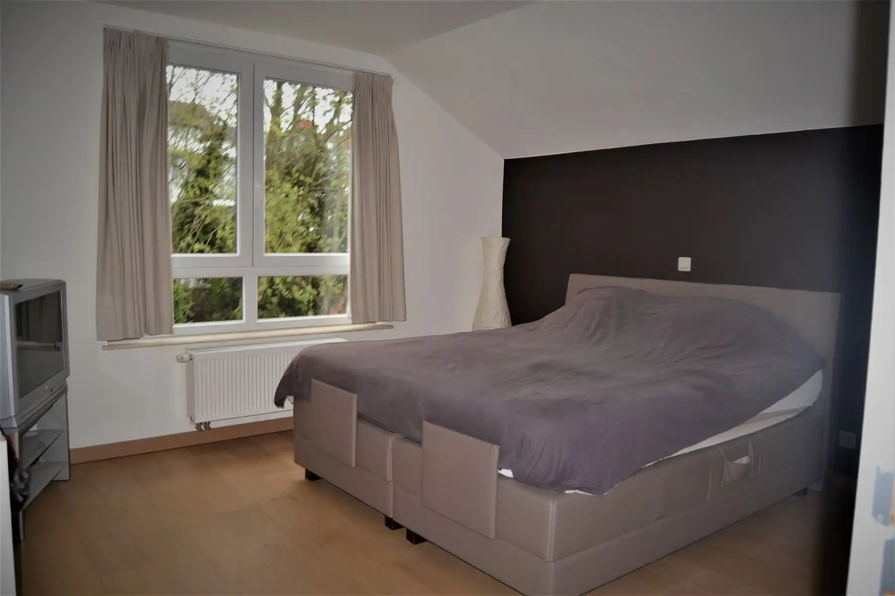 Recente instapklare woning met tuin foto 12