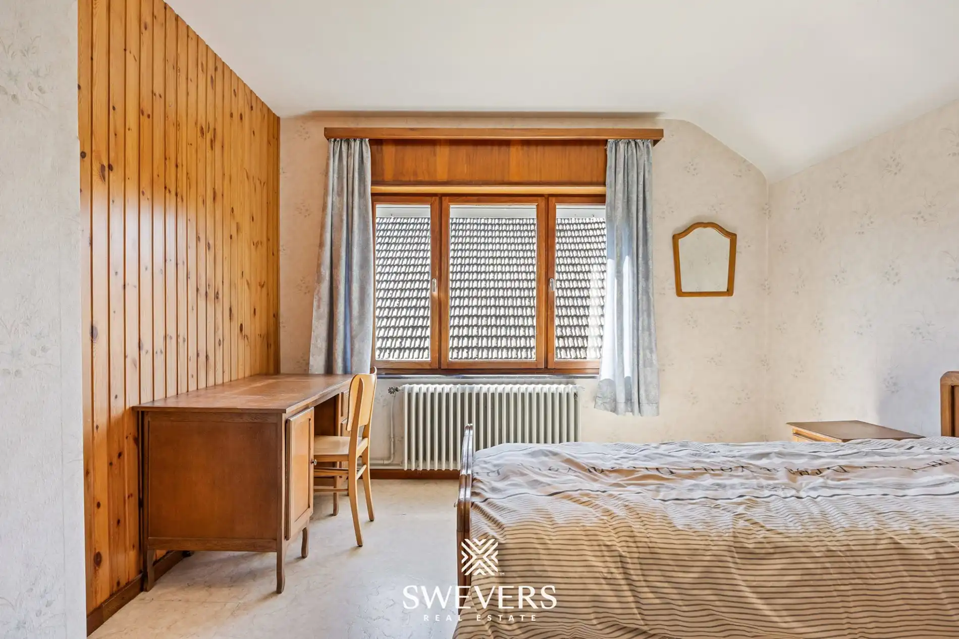 Op te frissen gezinswoning met 4 slaapkamers en veel potentieel foto 20