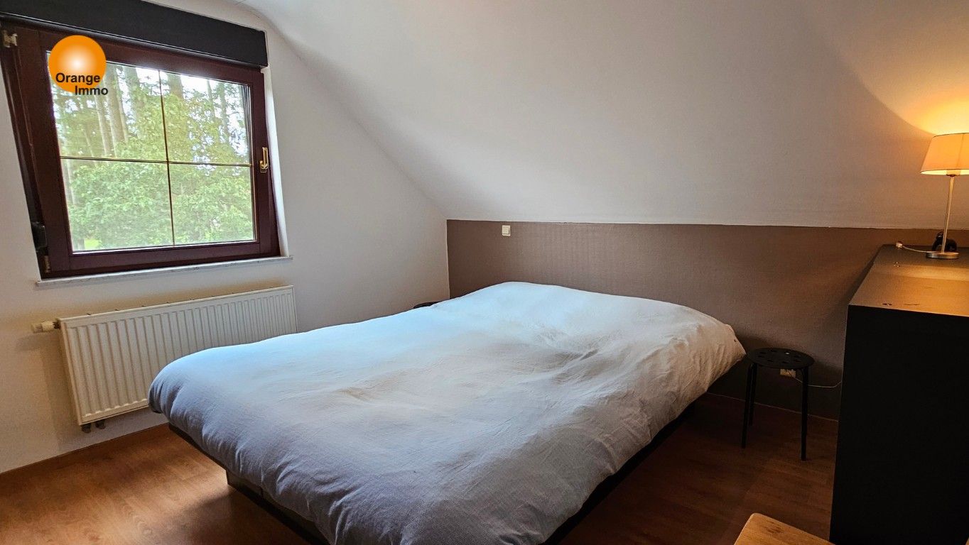 Woning met 4 slaapkamers, rustig gelegen in groene omgeving. foto 7