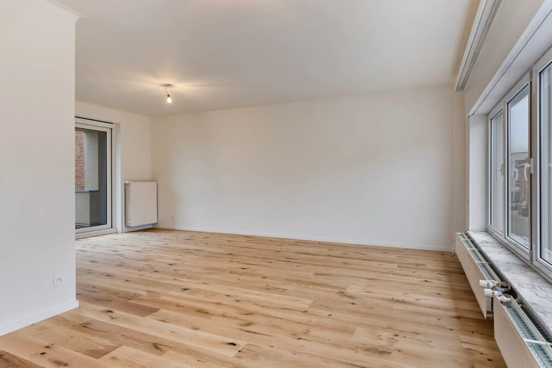 Instapklare woning met 3 slpk, garage en tuin! foto 7