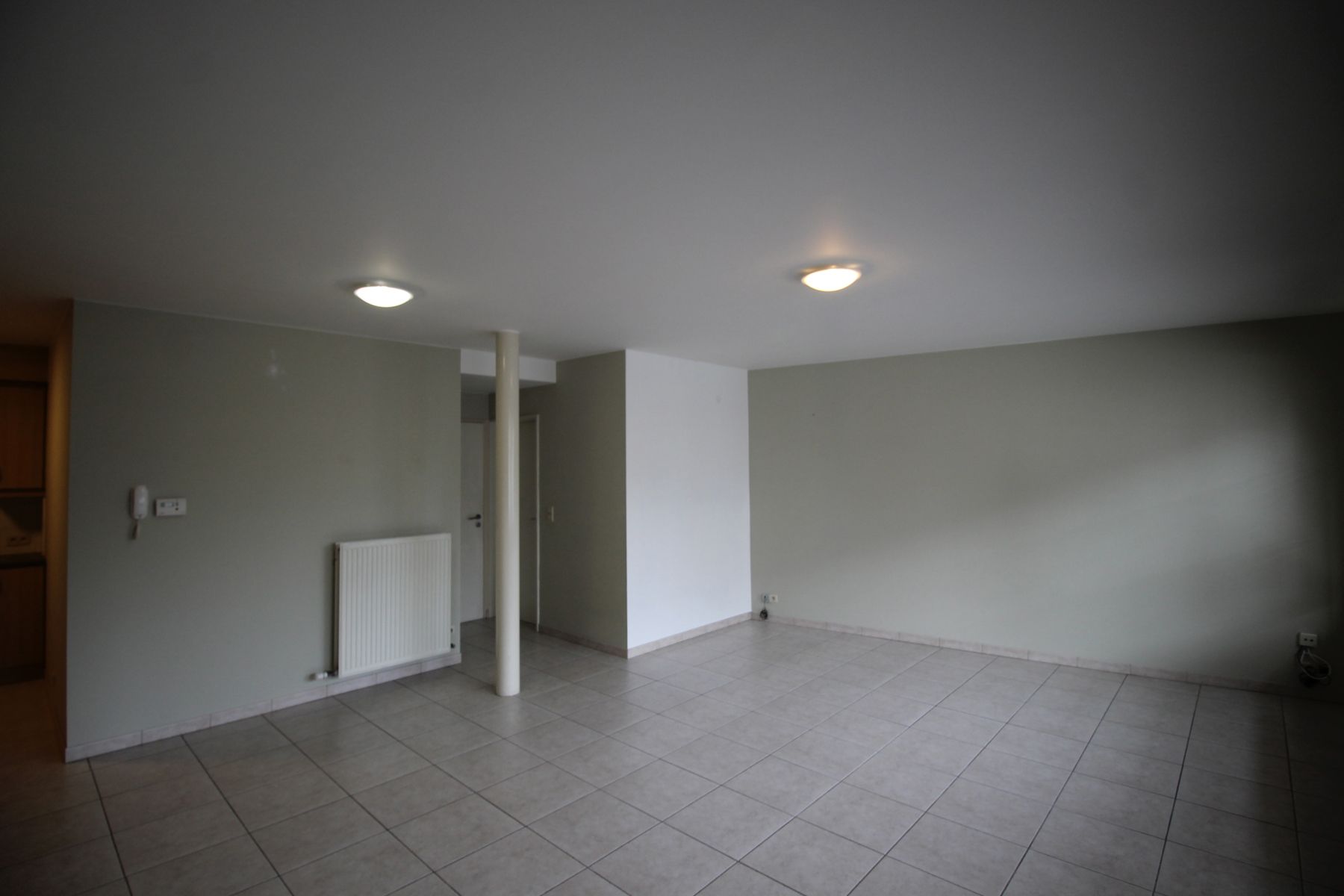 Een gezellig appartement op benedenverdieping vooraan - met garage foto 3