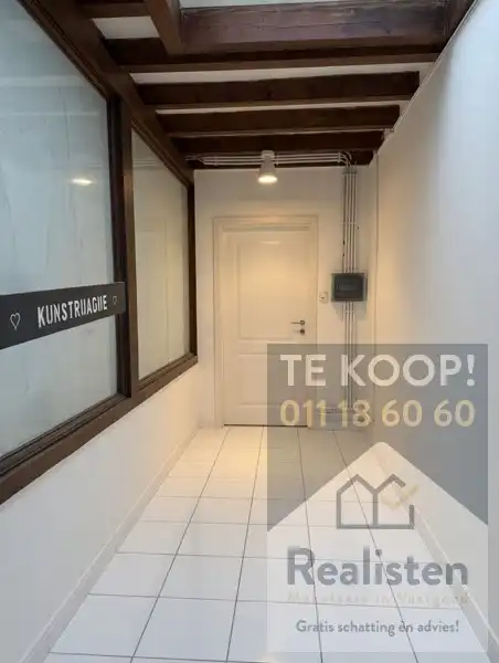 2 Appartementen + 4 winkels foto 5