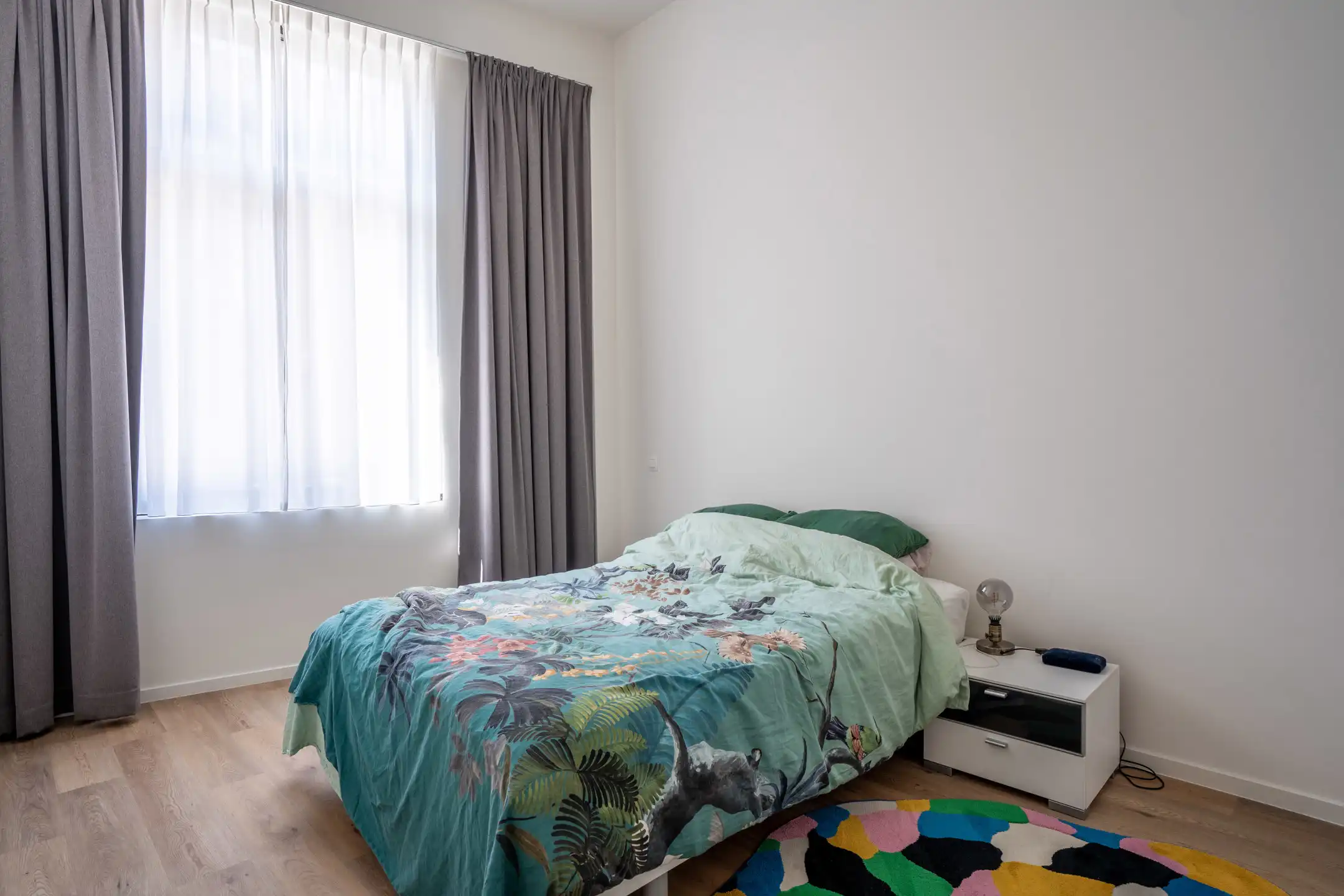 Knap en licht gelijkvl. appartement met terras en tuin foto 28