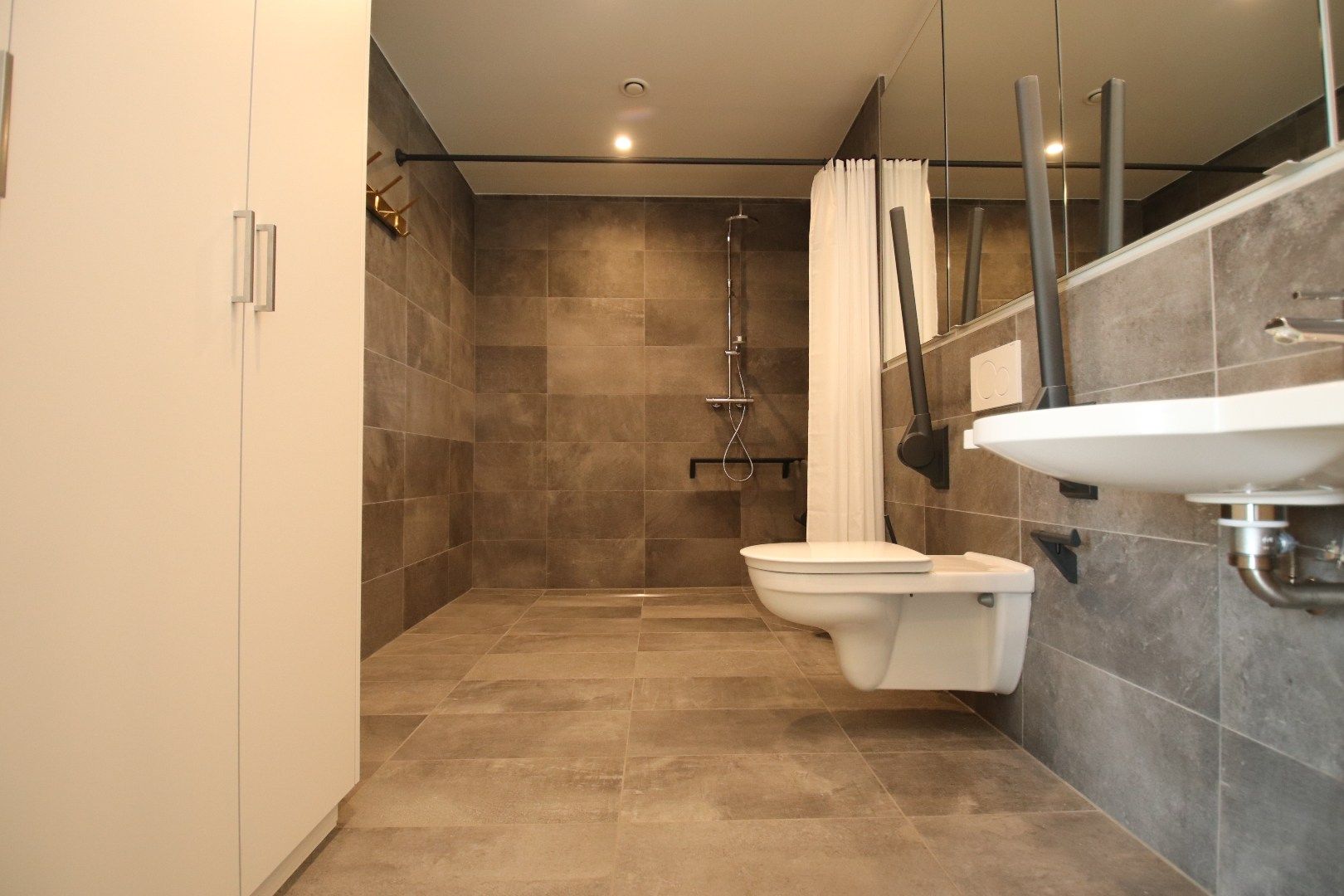 ASSISTENTIEFLAT MET ONDERGRONDSE PARKEERPLAATS foto 11