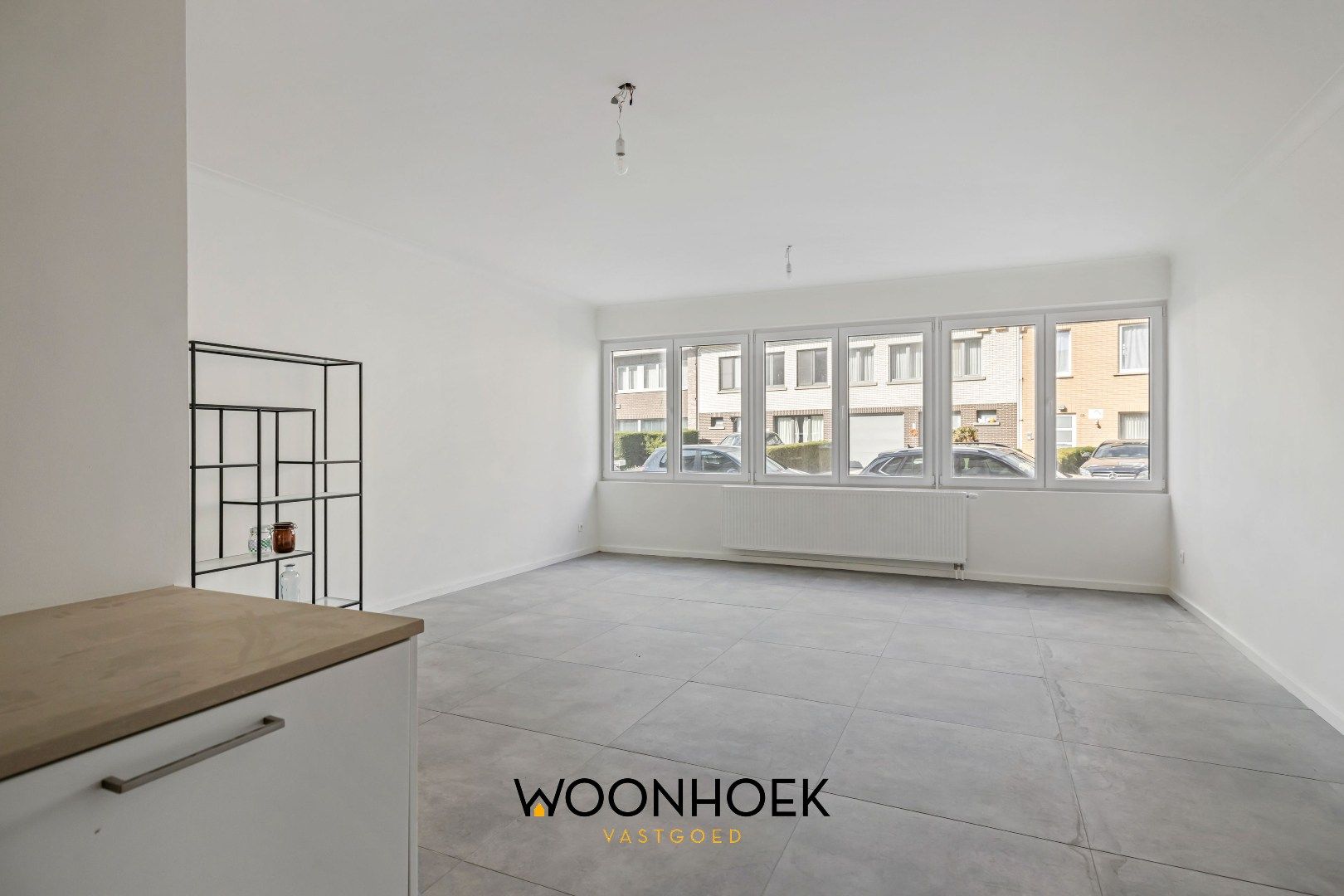 Gerenoveerd appartement op toplocatie te Belsele! foto 3