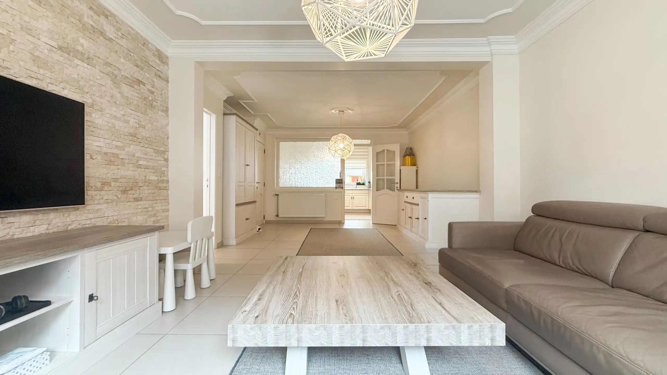 Gezinswoning met 4 slaapkamers centraal in Heusden! foto 2