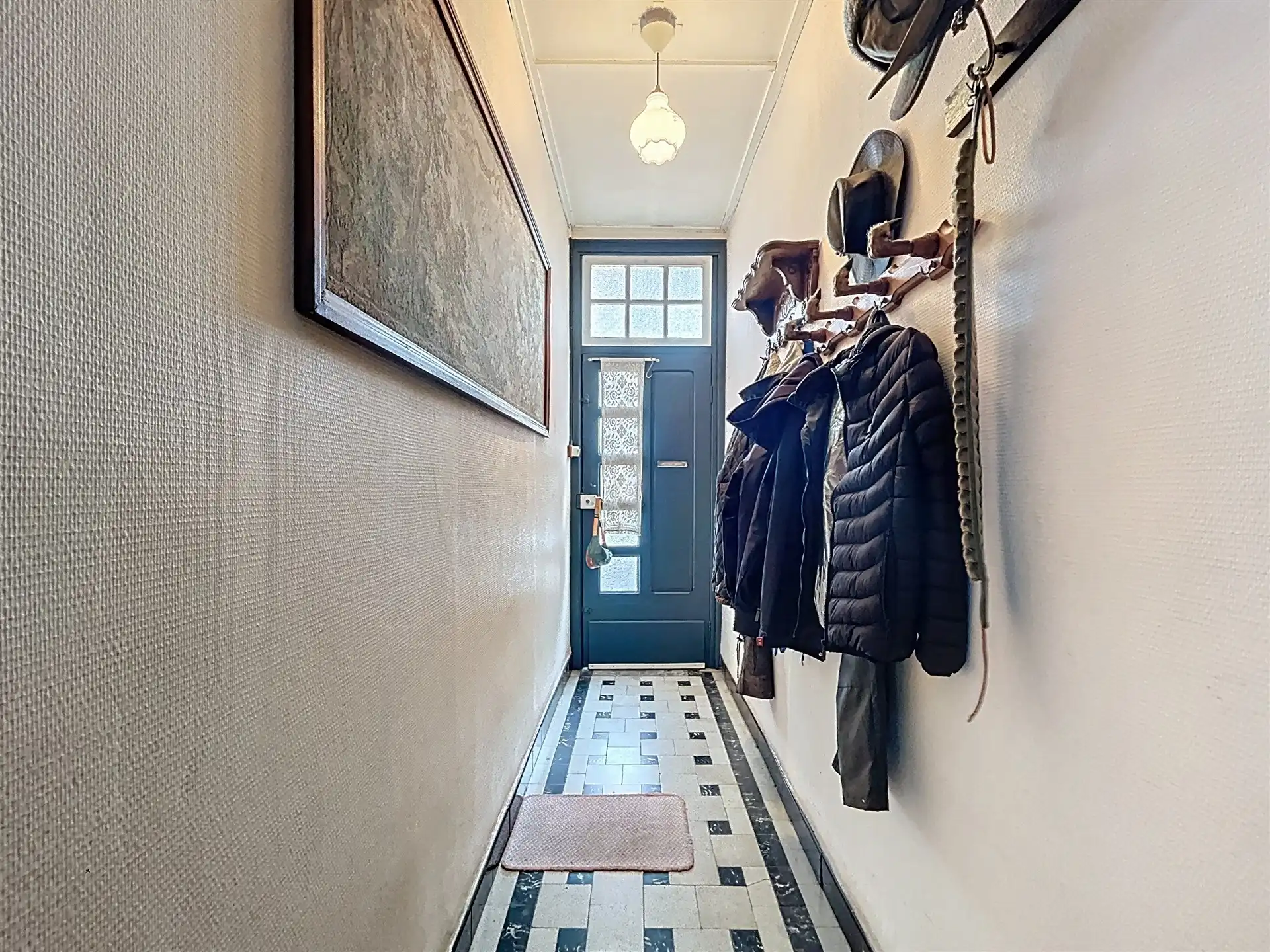  te renoveren woning met garage en tuin in rustige straat. foto 5