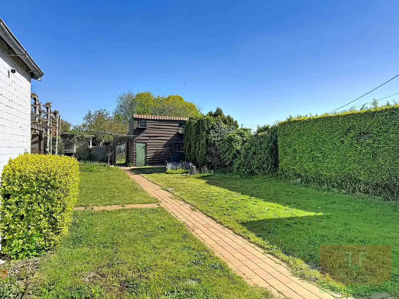 Halfopen gezinswoning met 3 slaapkamers en prachtige tuin te Ettelgem foto 24
