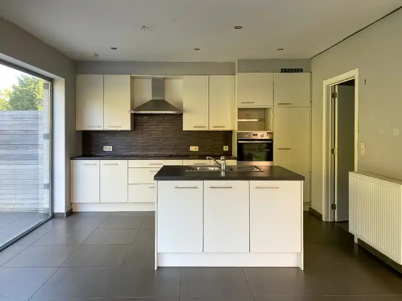 Verzorgde en instapklare woning met 3 slaapkamers en garage foto 4