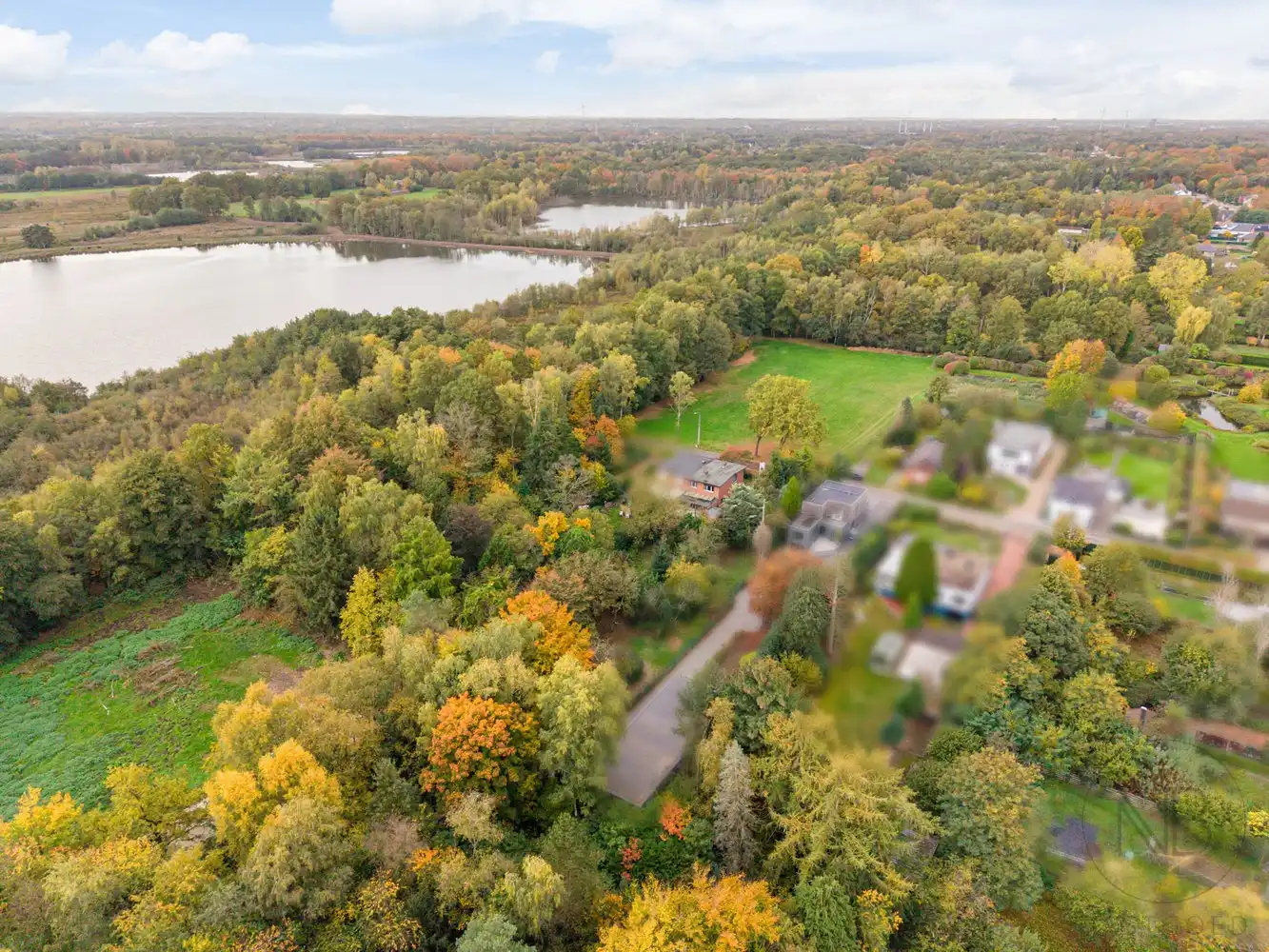 Woning met  bouwgrond te koop aan De Maten in Genk foto 4