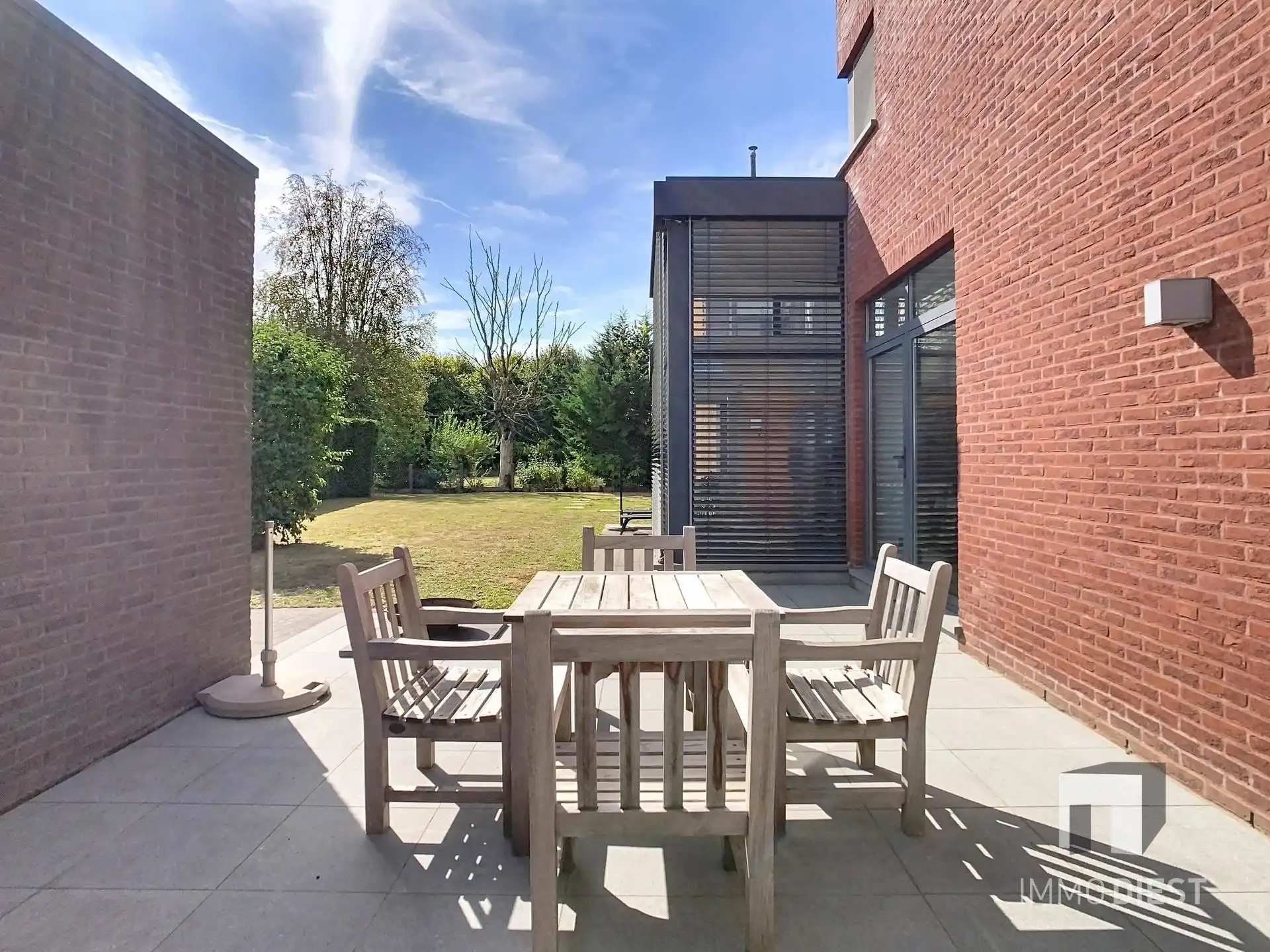 Moderne, lichtrijke woning met aangename tuin aan de voet van hartje Scherpenheuvel. foto 32
