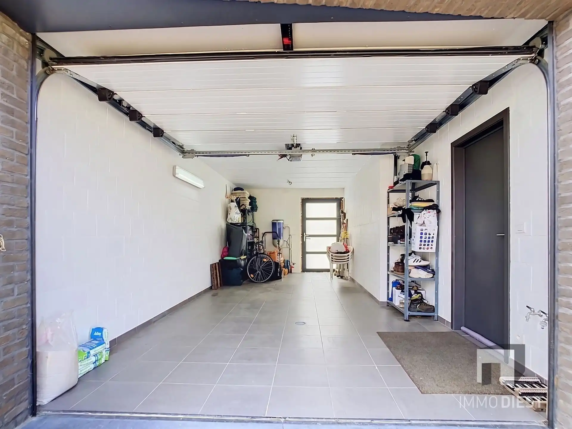 Moderne, lichtrijke woning met aangename tuin aan de voet van hartje Scherpenheuvel. foto 32